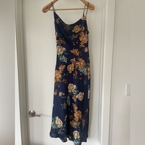 Hello Molly Atlas midi dress in navy and gold floral print with leg slit.